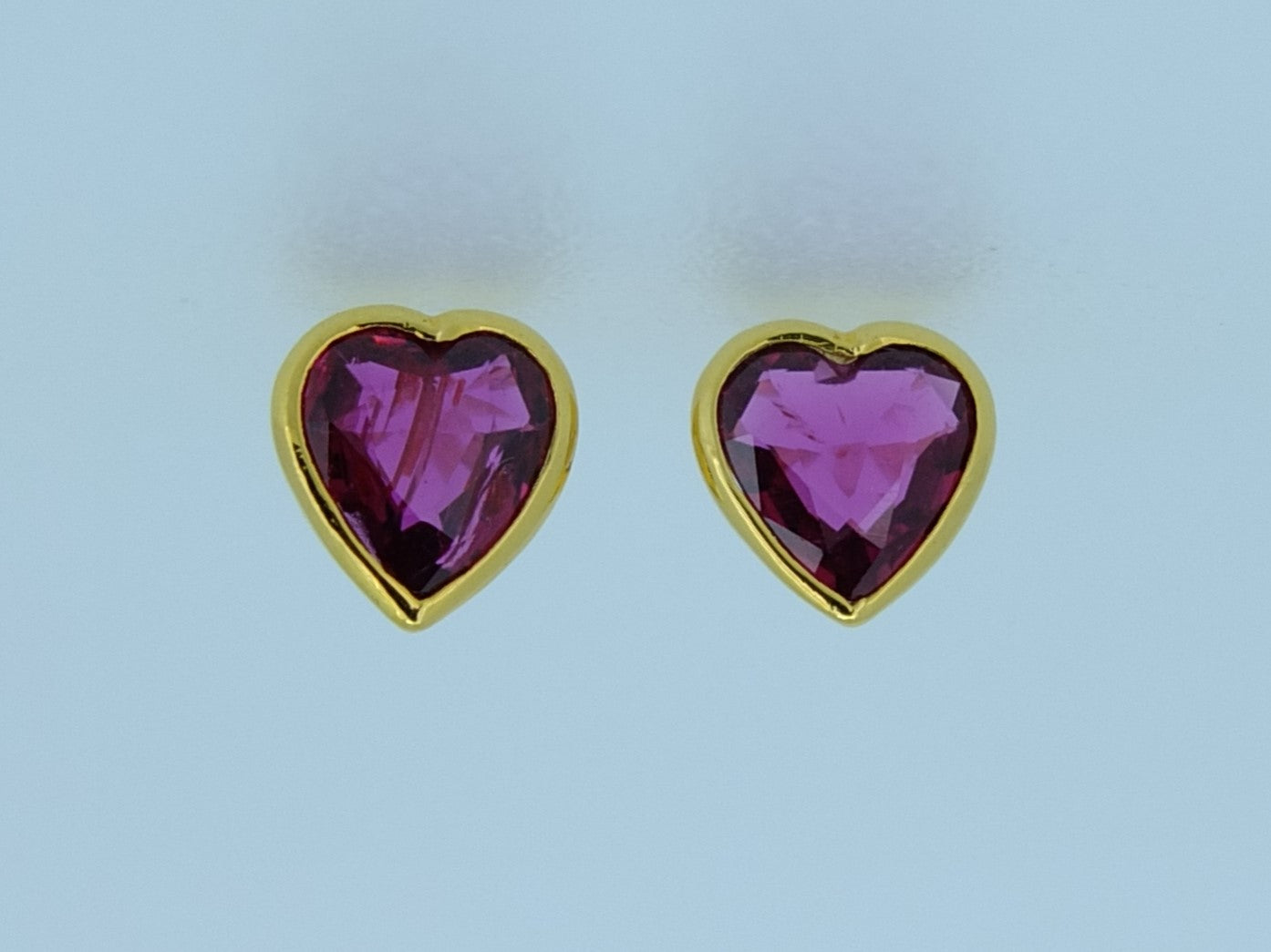 2.03 CT Ruby and 18 CT Gold earrings