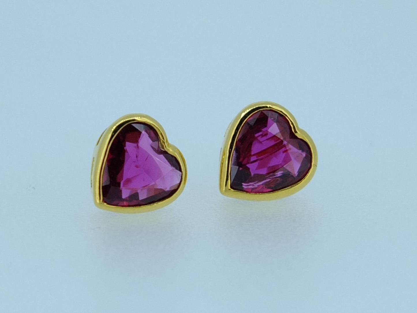 2.03 CT Ruby and 18 CT Gold earrings