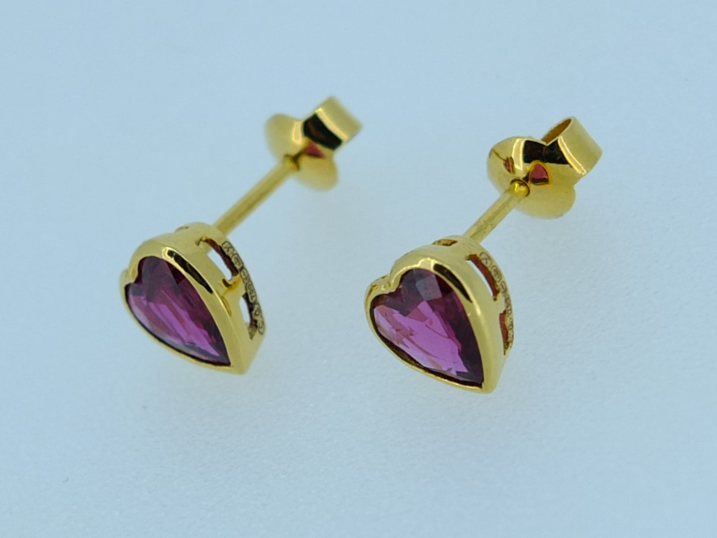 2.03 CT Ruby and 18 CT Gold earrings