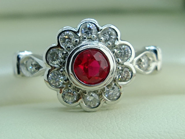 18 CT White Gold Ruby and diamonds ring